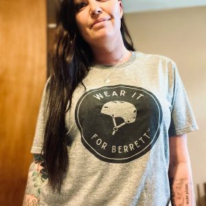 Woman wearing the Unisex Tri-blend Graphic Tee