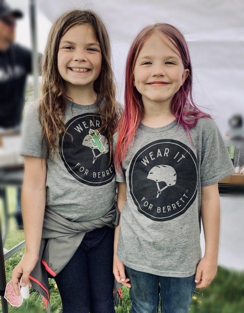 Two girls wearing the Youth Tri-blend Graphic Tee - Aluminum Grey